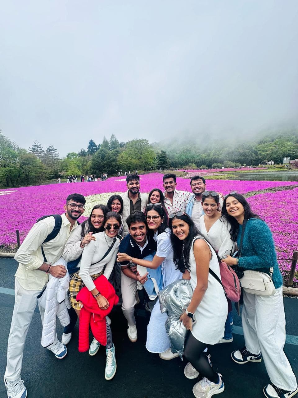 A Brew group in a field of pink flowers near Mt. Fuji
